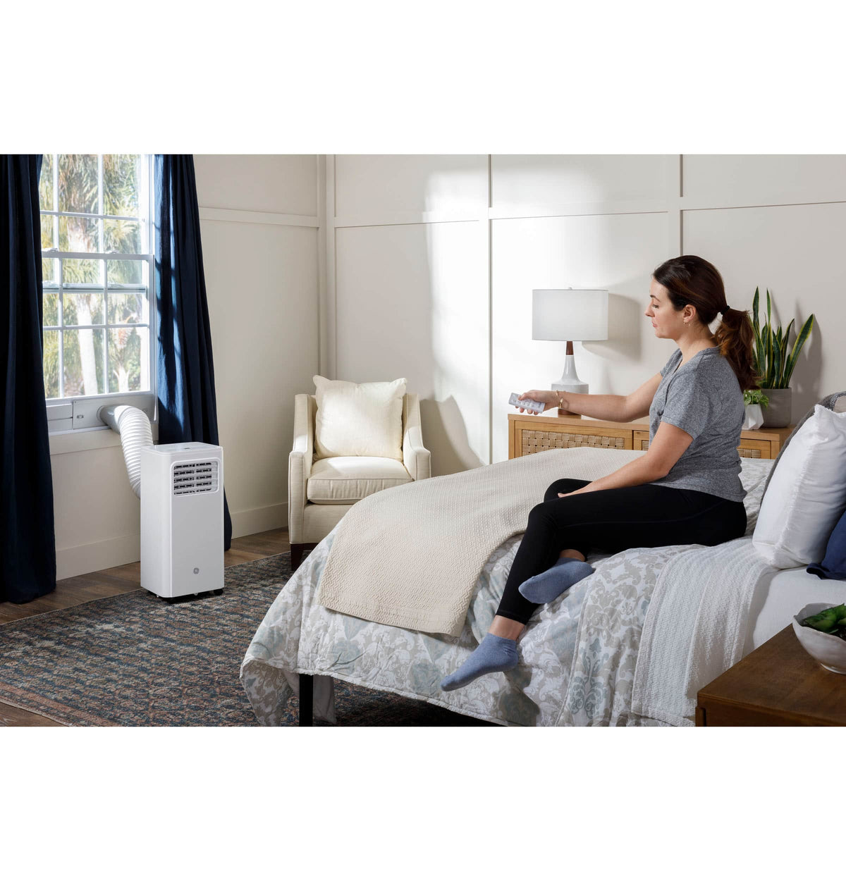 GE – 150 Sq. Ft. 5,000 BTU Portable Air Conditioner with Auto Evaporation Technology – White